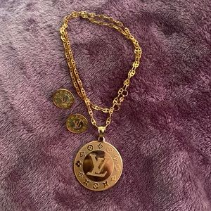 Louis Vuitton necklace and earrings